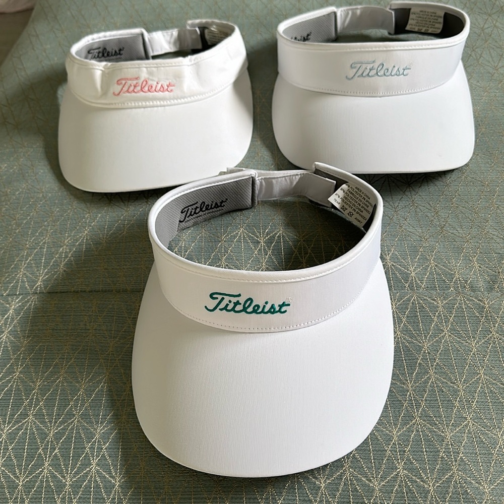 Titleist Golf Visors - large brim, adjustable Velcro back closure.